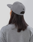 Sigma - snapback cap - silver - new era style - back female view